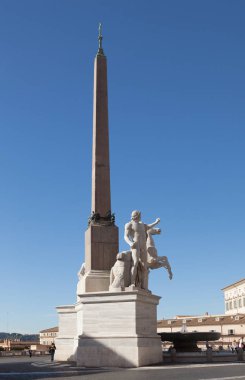 ROME, ITALY - OCTOBER 12, 2016: View to the Quirinal Square with the obelisk and marble statues clipart
