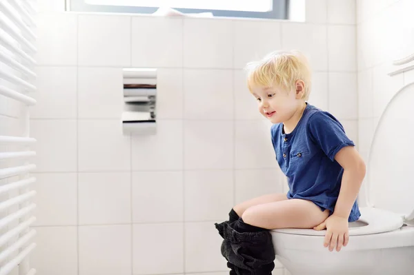 Cute little boy in restroom — Stock Photo, Image