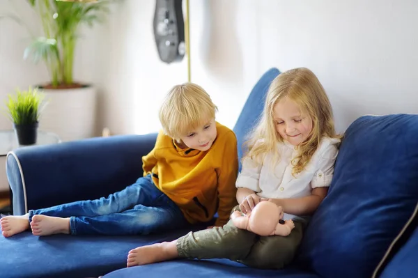 Little Childs Playing Doll Sofa Boy Girl Play Together Quiet — Stock Photo, Image