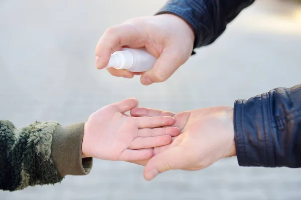 Mature Man Little Child Makes Disinfection Hands Sanitizer Airport Supermarket — Stock Photo, Image