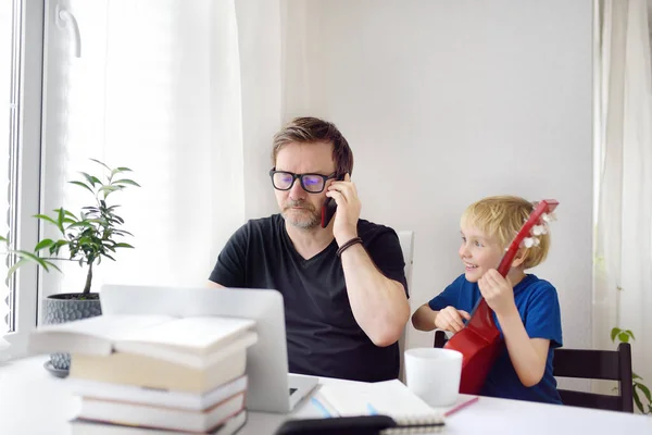 Man Working Home Laptop Quarantine Home Office Parenthood Same Time Stock Image