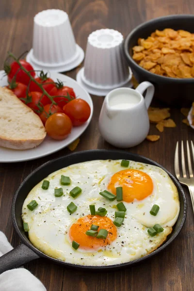 Breakfast on brown wooden background — Stock Photo, Image