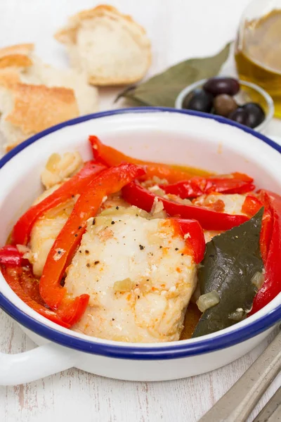 Fish stew with red pepper in dish — Stock Photo, Image