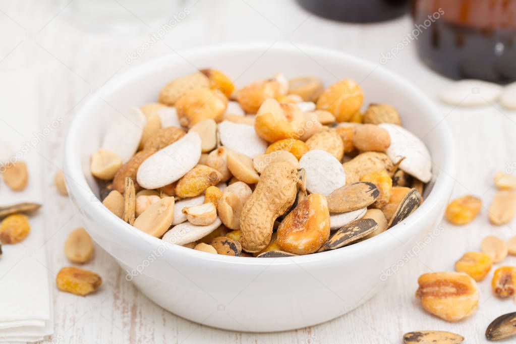 salted nuts and seeds on white dish