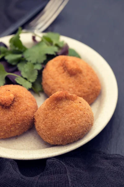 Traditional portuguese appetazer on white dish — Stock Photo, Image