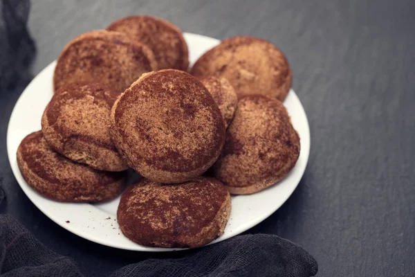 Cinnamon cookies on white plate — Stock Photo, Image