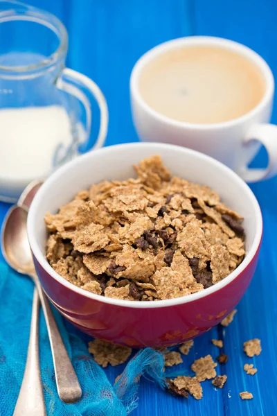 Cereals with chocolate cereals in red bowl — Stock Photo, Image
