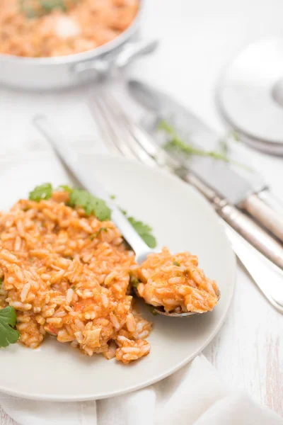 Rice with fish and seafood on plate — Stock Photo, Image