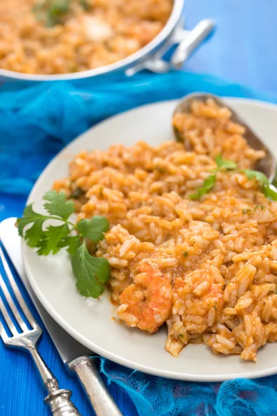 Rice with fish and seafood on plate — Stock Photo, Image