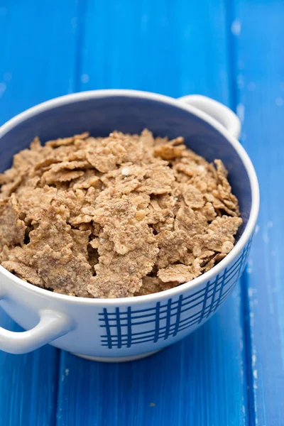 Cereals in white blue bowl — Stock Photo, Image