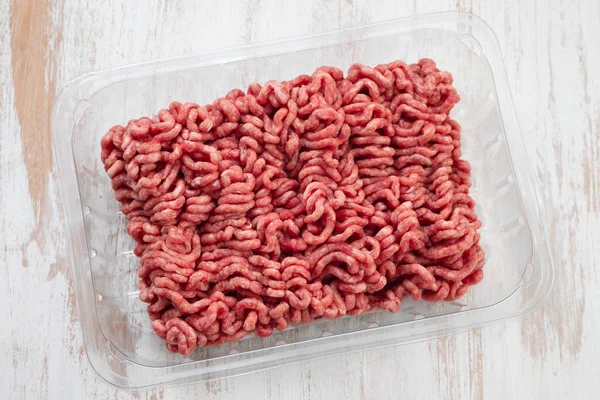 Fresh Raw Ground Meat Plastic Box Ceramic Background — Stock Photo, Image