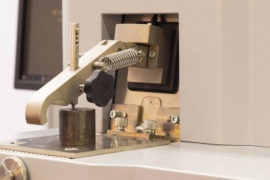 Emission Spectrometer for chemical composition analysis using as quality control equipment in lab ; engineering equipment background