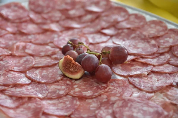 Plate Slices Raw Salami Sliced Figs Grapes Excellent Lunch Italian — Stock Photo, Image