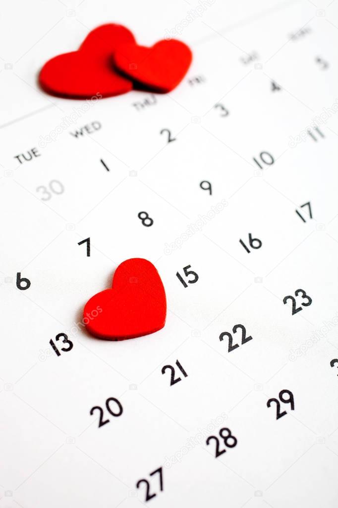 Red hearts on calendar