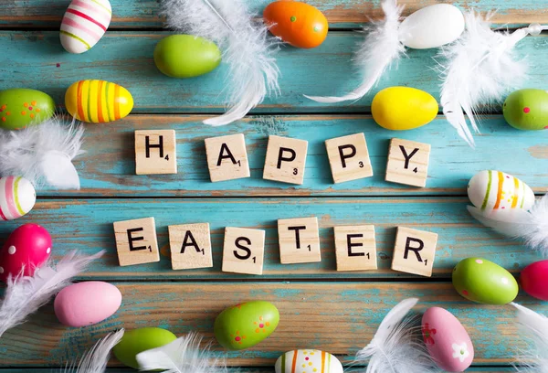 Happy Easter written with wooden letters — Stock Photo, Image