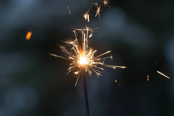 Sparkler burning in the dark — Stock Photo, Image