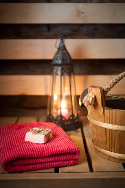 Water bucket, towel and soap — Stock Photo, Image