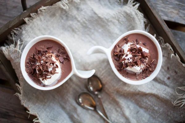 Chocolate pudding with whipped cream