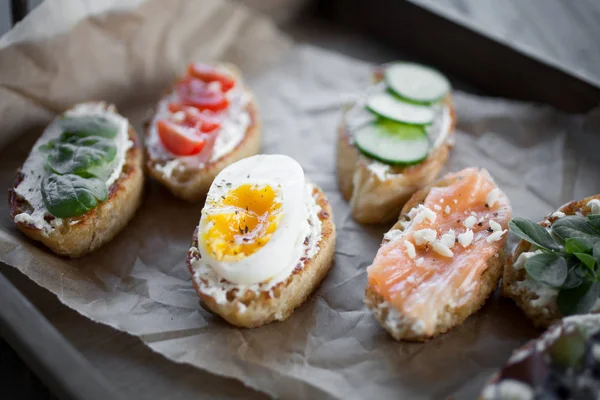 Homemade crostinis with toppings — Stock Photo, Image