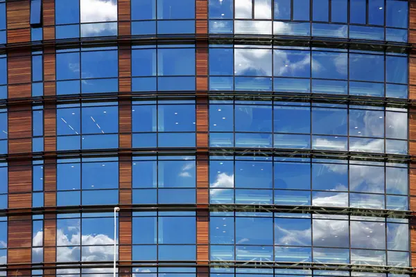 Blue glass wall of office building close up — Stock Photo, Image