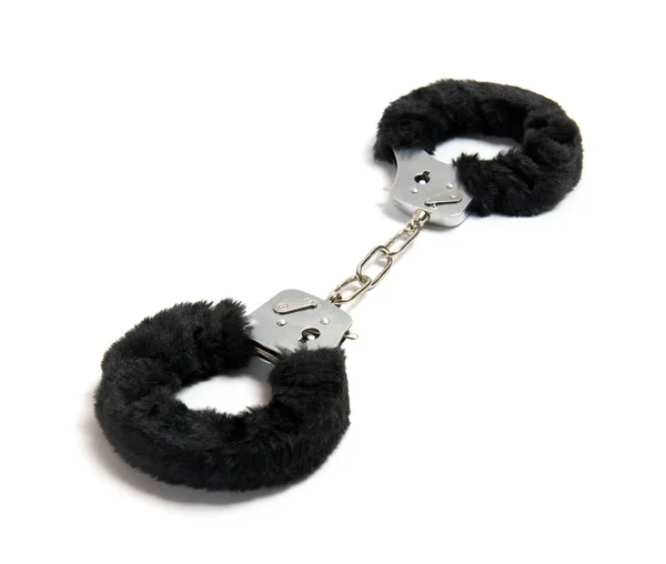 Black handcuffs isolated on white — Stock Photo, Image