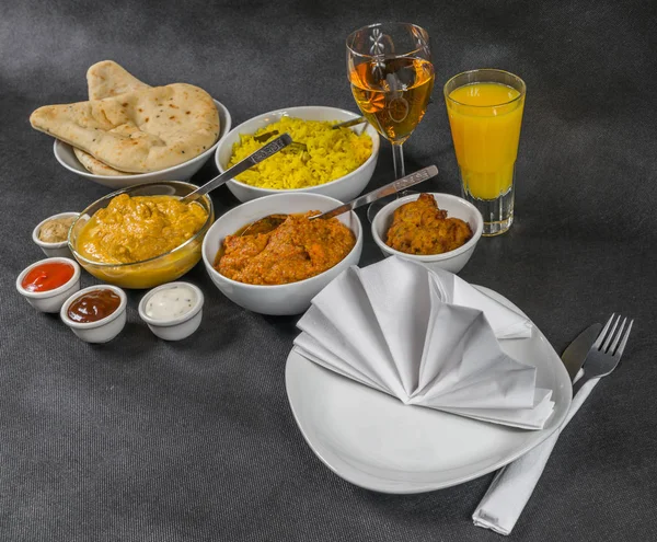 Oriental Indian set, chicken korma, chicken tikka masala, pilau Stock Picture