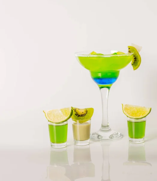 Colorful drink in a margarita glass, blue and green combination,