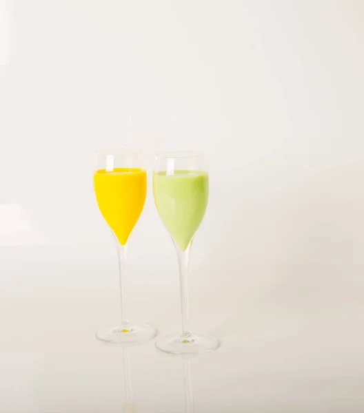 Colorful drinks based on milk liqueurs, unique pastel colors of