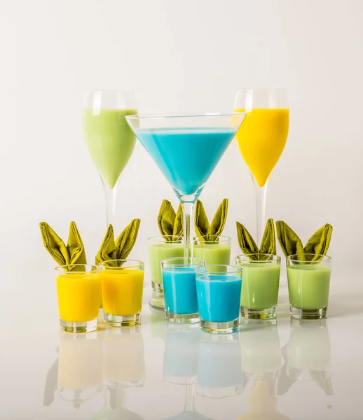 Colorful drinks based on milk liqueurs, unique pastel colors of