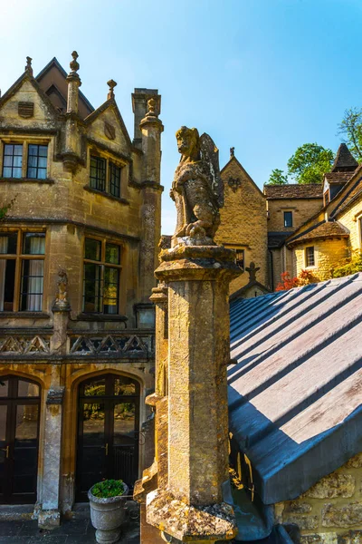 Old sculpture on the pedestal, beautifully preserved old artisti