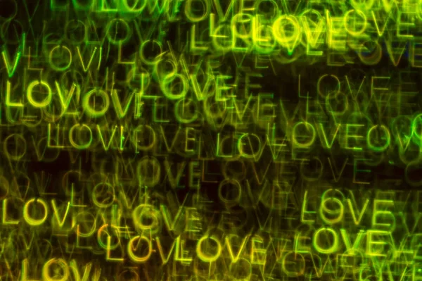 Beautiful background with different colored word love, abstract — стоковое фото