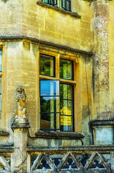 Old sculpture on the pedestal, beautifully preserved old artisti