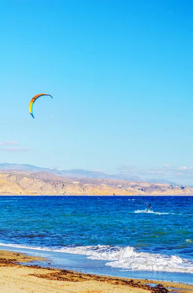 kitesurfer on sea waves, water extreme sport, active sport, adve