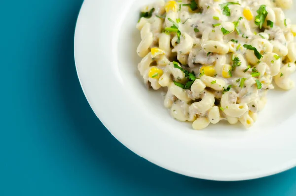Cooked pasta with flaked tuna and sweetcorn in mayonnaise dressing, healthy salad