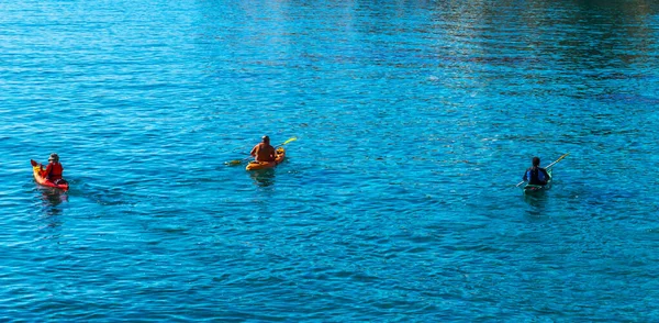 Senior kayaker on a kayak by the sea, active water sport and leisure, kayaking