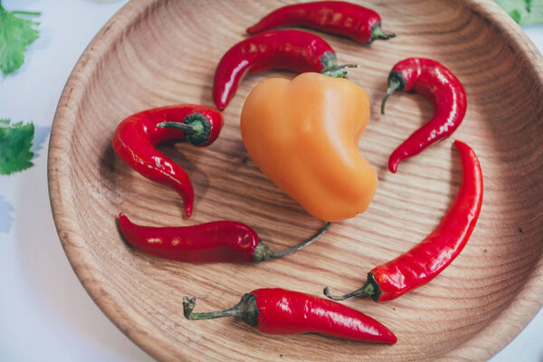 Culinary background with fresh vegetables on cutting board