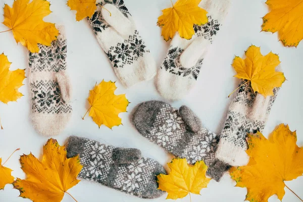 Stack of Handmade Warm Knitted Socks Scarfs Mittens From Rough Wool Yarn Brown Beige Grey. Close up. Winter Autumn Eco Fashion Kinfolk Style. Natural Materials