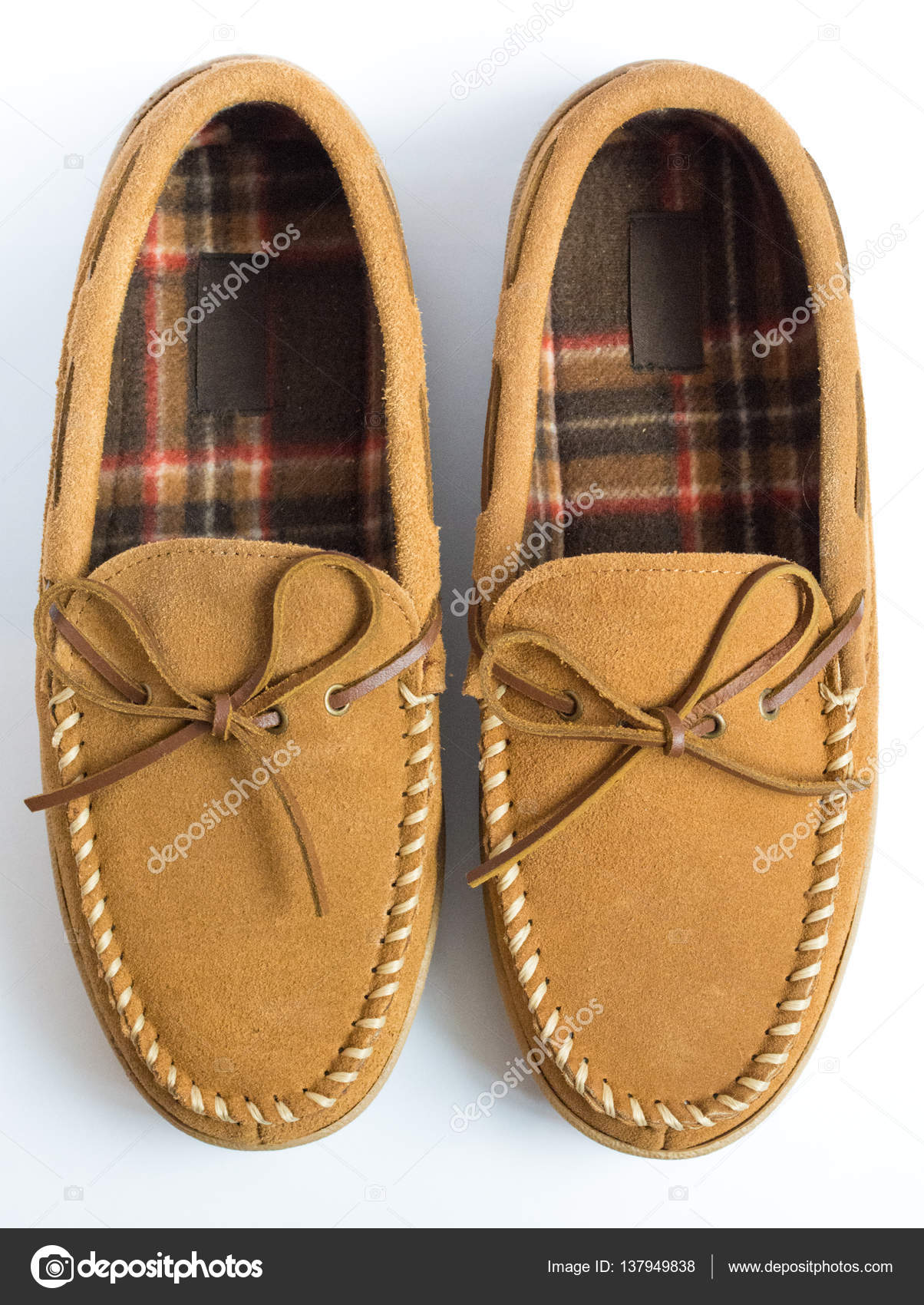 Download Pair of Moccasin Slippers Top View Closeup — Stock Photo ...