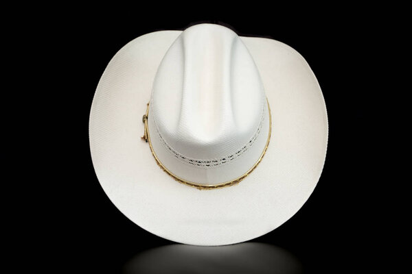 White Cowboy Hat on a Dark Background
