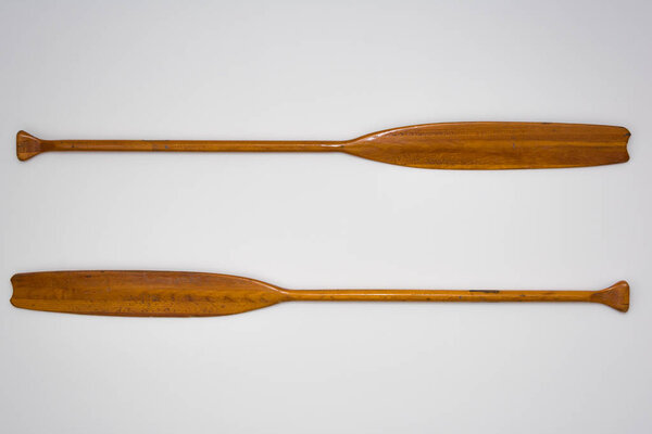 Vintage Wooden Paddle Oars Close Up on White Background