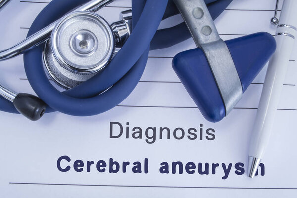 The diagnosis of Cerebral aneurysm. Paper medical history with diagnosis of Cerebral aneurysm, on which lie stethoscope, neurological hammer and pen. Medical concept for neurology and neuroscience