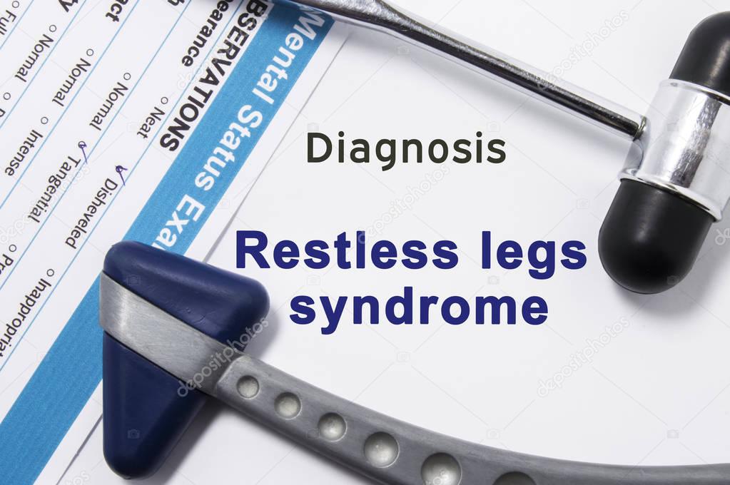 Diagnosis of Restless legs syndrome. Two neurological hammer, result of mental status exam and name of neurologic psychiatric diagnosis Restless legs syndrome on a white background or on doctor table 