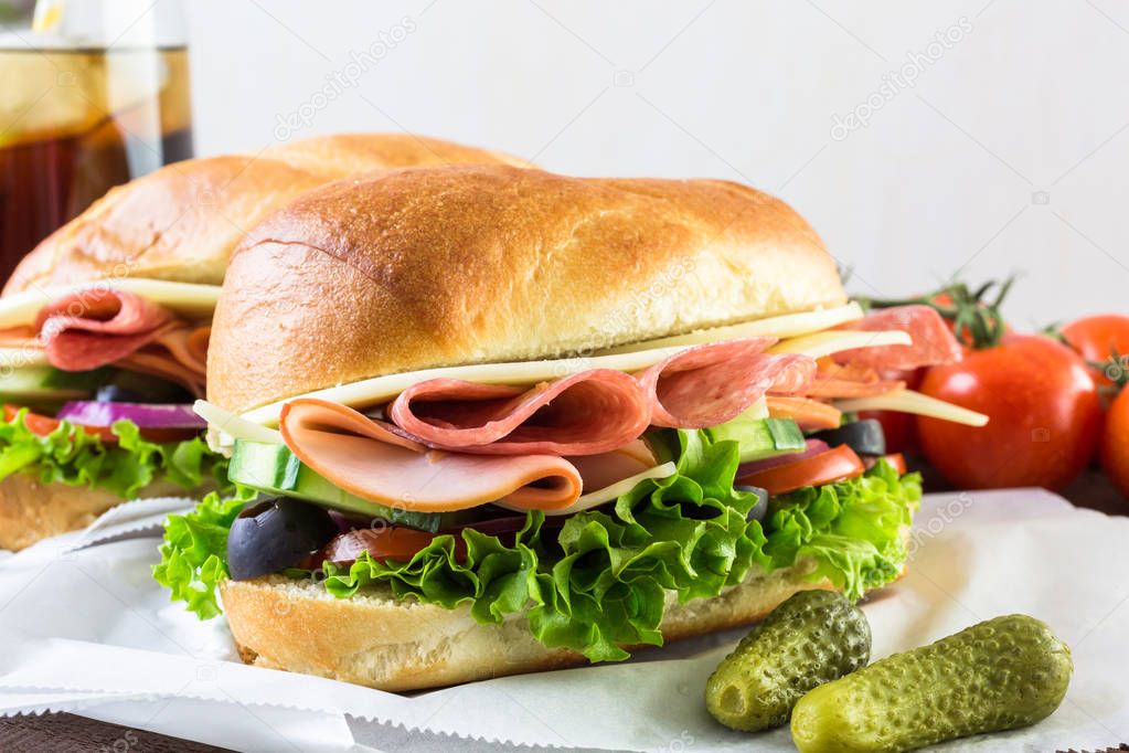 Sub sandwiches with cola