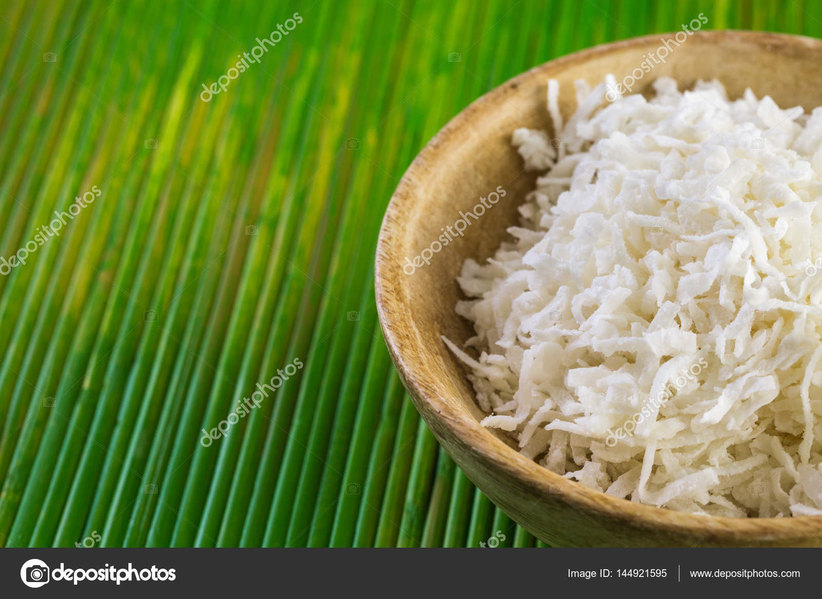 Dehydrated coconut flakes Stock Photo by ©urban_light 144921595