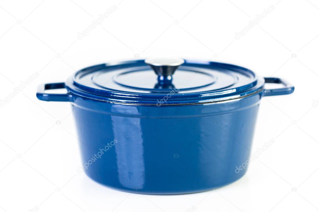 Blue enameled cast iron covered dutch oven on a white background.