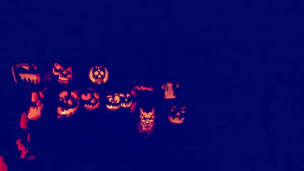 Glowing pumpkins close up — Stock Photo, Image