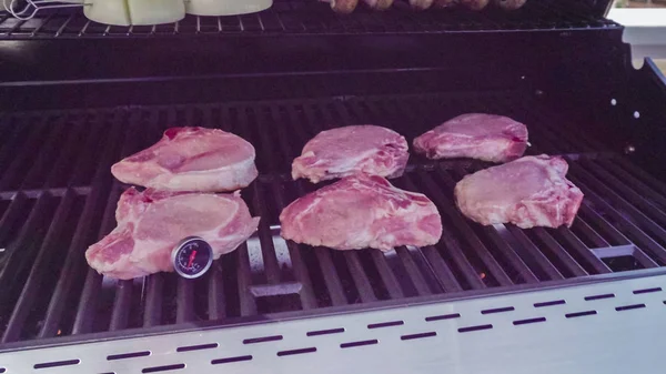 Grilling pork chops — Stock Photo, Image