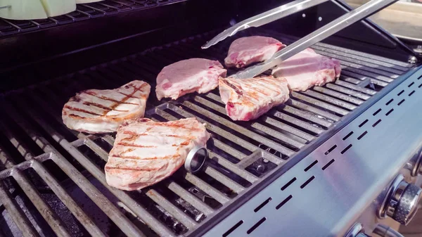 Grilling pork chops — Stock Photo, Image