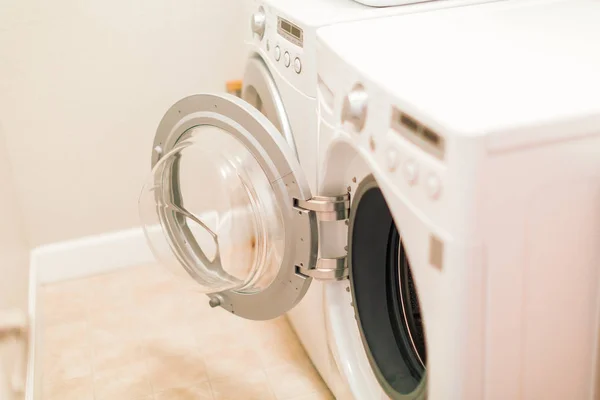 Doing laundry in laundry room