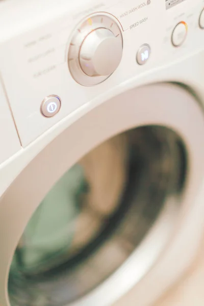 Doing laundry in laundry room